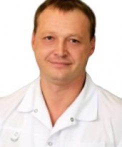 Комогоров Александр Иванович стоматолог